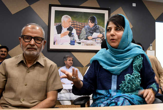 To stem rebellion, Mehbooba meets two party dissidents