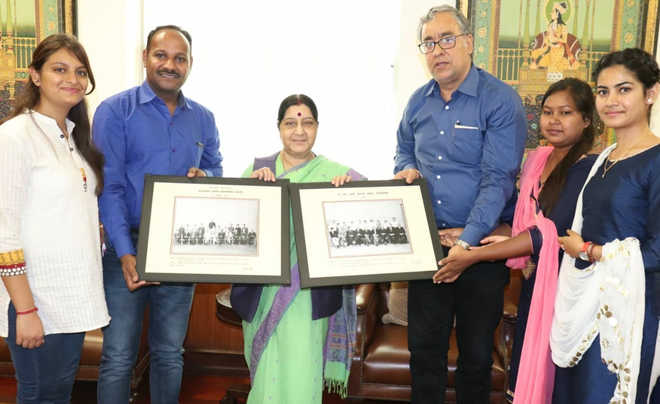 Union Minister Sushma Swaraj presented  photo of student days