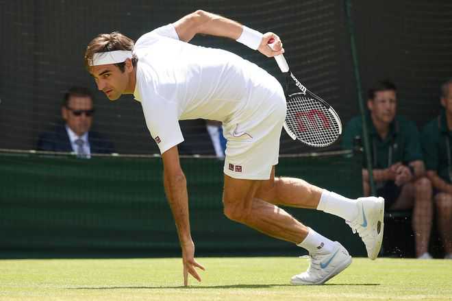 ...Federer goes down