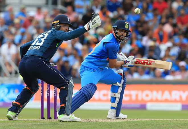 Kohli hits 71 but England manage to restrict India to modest 257
