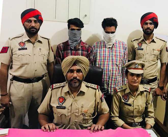 Two held with 50 cases of liquor
