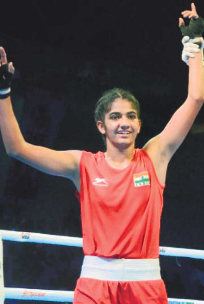 Nitu packs a punch, thanks to her father