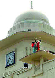 Height of protest: Nurses climb atop medical college building
