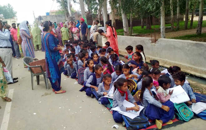 Villagers oppose transfer of teacher