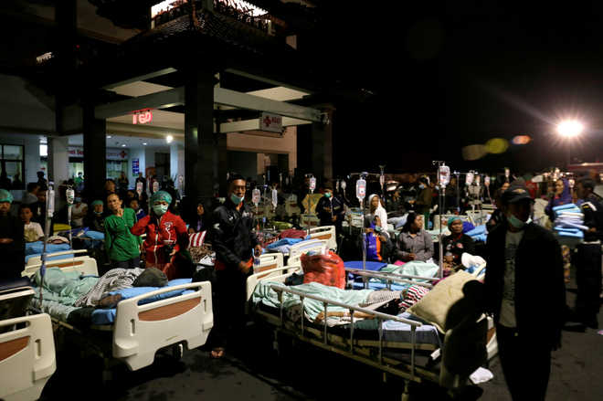 82 dead as powerful quake jolts Indonesia
