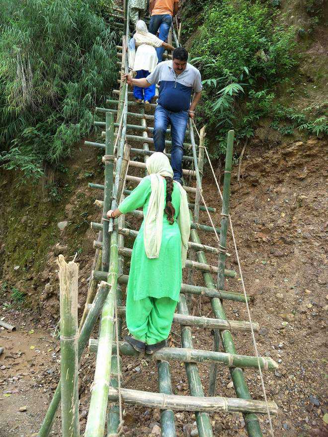 Bamboo stairs the only way to reach village
