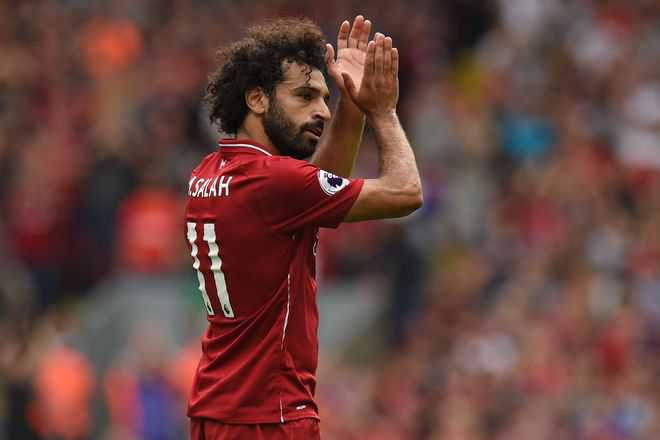 Salah reported by own club for phone use while driving