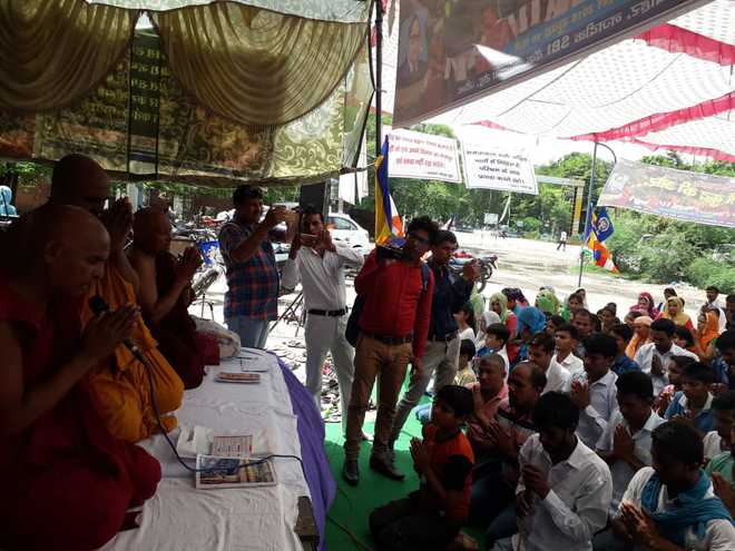 Dalit protesters ‘embrace’ Buddhism in Jind