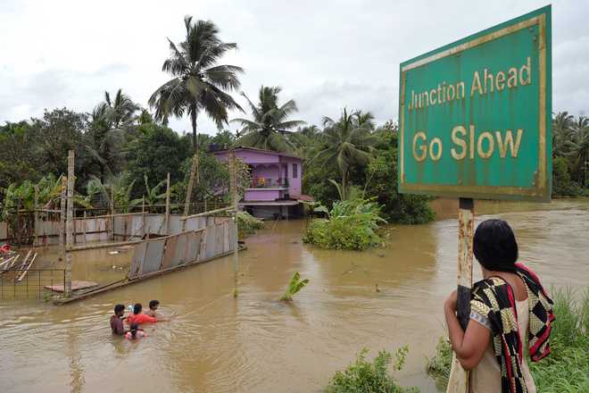 Kerala floods: Rescuers battle treacherous conditions to rescue animals