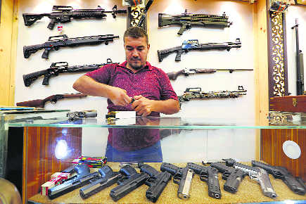 Baghdad gun shops thrive after Iraqi rethink on arms control