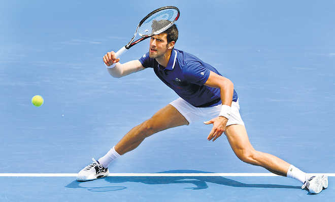 Djokovic wins men''s tennis title in Cincinnati, defeats Federer