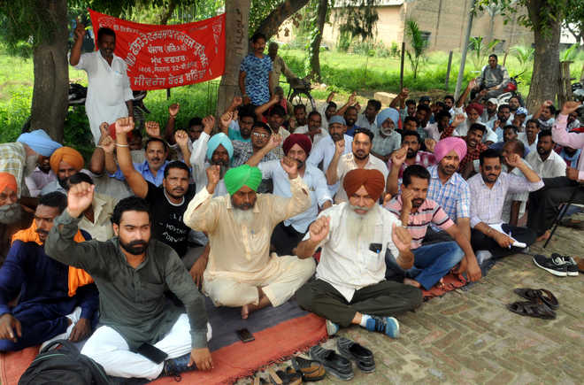 PWD workers protest delay in releasing salary