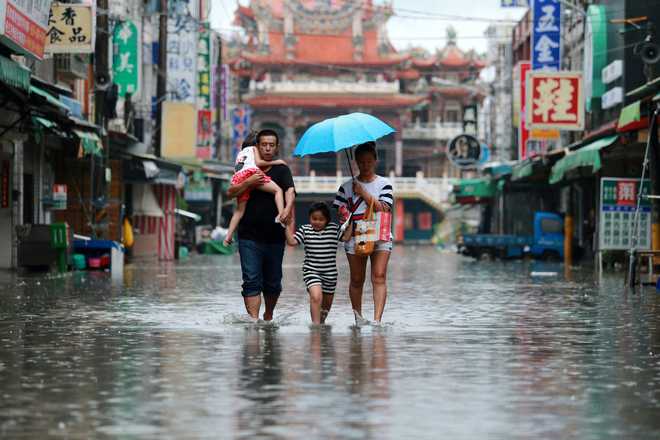 Six Dead Thousands Evacuated In Taiwan Floods The Tribune India 