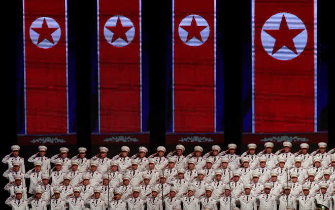 No long-range missiles, N Korea military parade features floats and flowers