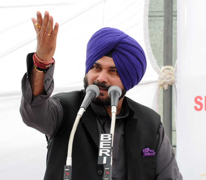 It was just a hug, and not a Rafale deal: Sidhu