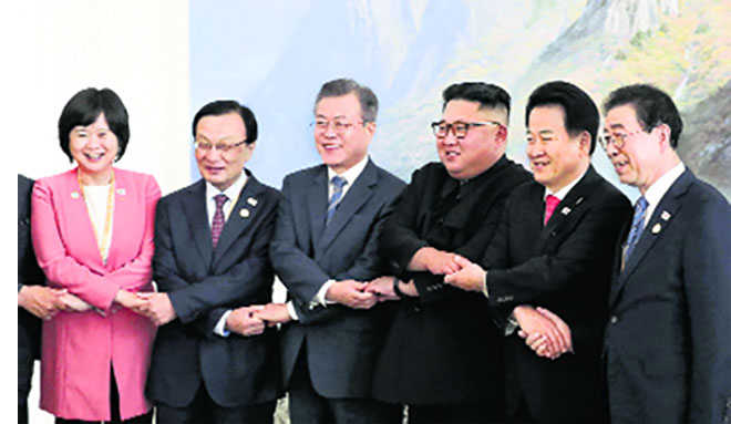N Korea’s Kim to visit Seoul, shut missile site