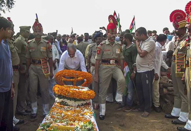 Amid anger against Pak, mortal remains of BSF jawan consigned to flames