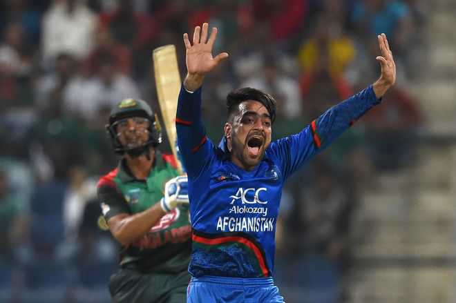 Rashid wrecks Bangla for 136-run win