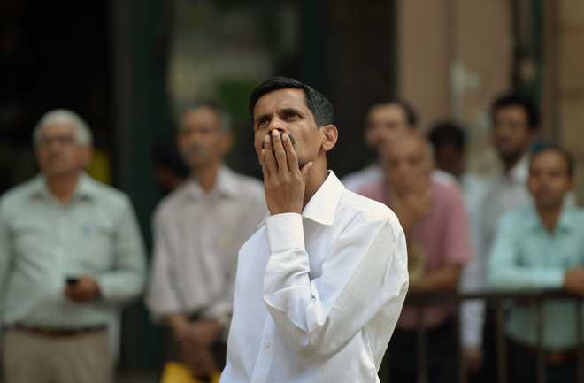 Sensex nurses losses after 1,100-pt flash crash; logs 3rd weekly fall