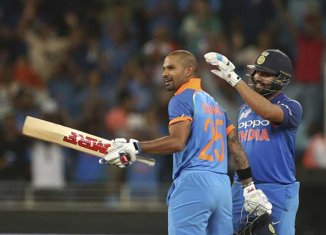 Rohit, Shikhar smash tons as India crush Pakistan by 9 wickets