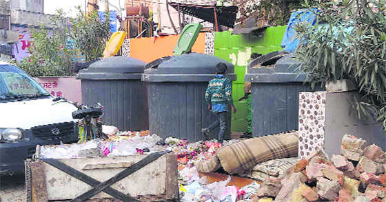 Locals raise stink over garbage woes