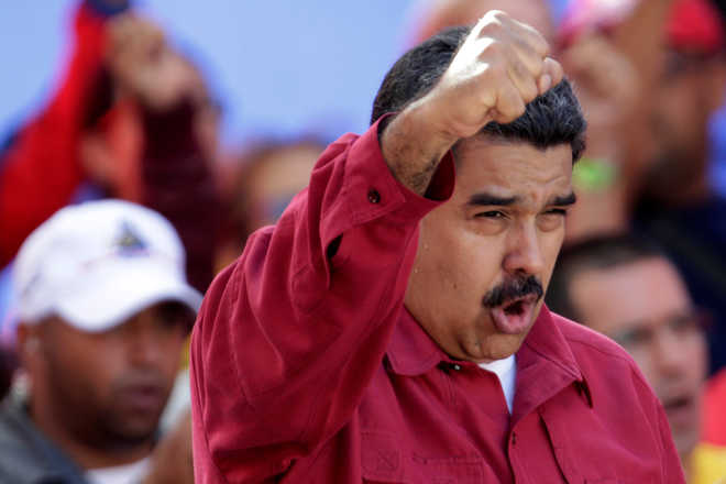 Maduro dismisses legitimacy questions as second term looms