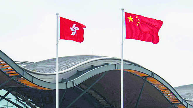 HK unveils law banning insults to Chinese national anthem