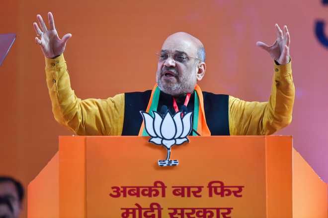 Shah, BJP resolution tell party workers not to lose morale due to recent poll reverses