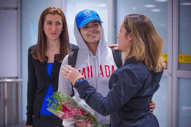 Saudi teen who fled her family arrives in Canada