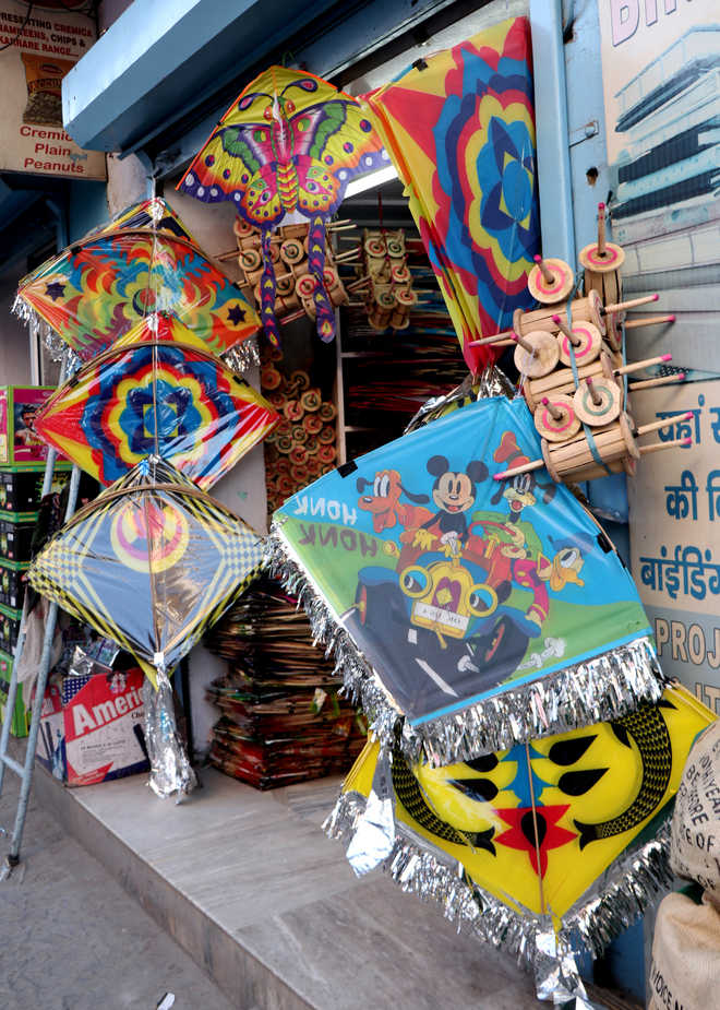 City markets flooded with colourful kites