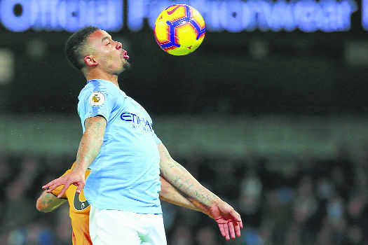 City ease past 10-man Wolves to cut gap at top