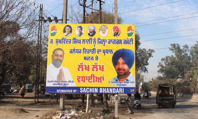 Hoardings without Dev’s pictures flare up controversy
