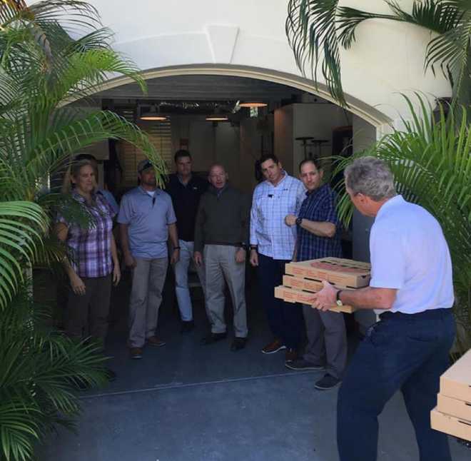 George W Bush delivers pizza to unpaid Secret Service personnel