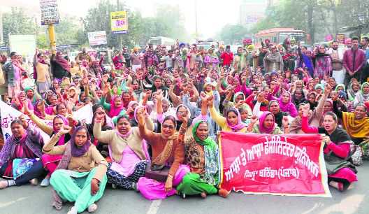 Contractual workers take out march, block traffic