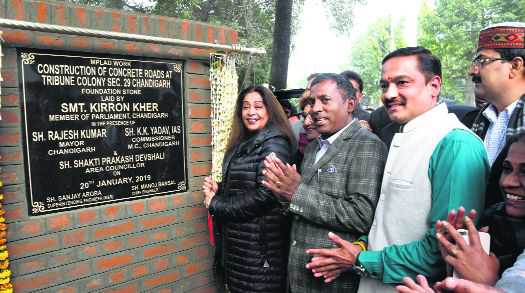 Kirron lays stone for construction of roads at Tribune Colony