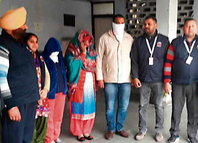 Cop, two women held for duping govt officials