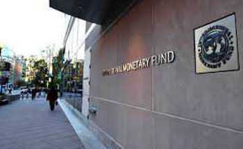 IMF revises down global growth projections