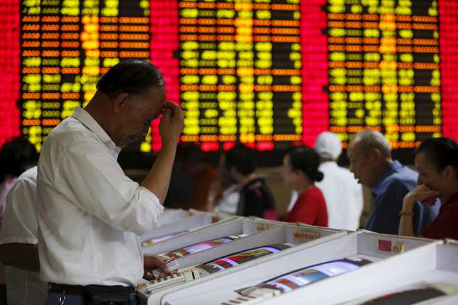 Asian markets swing as dealers battle uncertainty