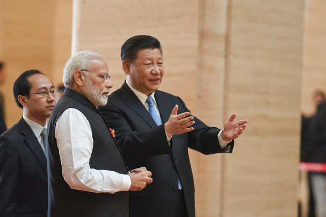 Not aware of plans by Xi to visit India: Chinese FM