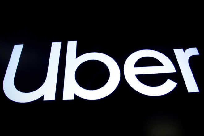 Malaysia proposes $20 mn fine on ride-hailing firm Grab for 