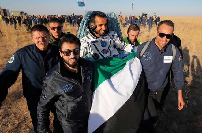 Emirati, US, Russian astronauts return to Earth