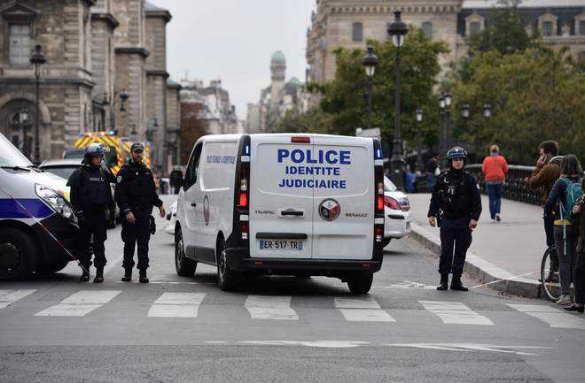 Four Paris cops stabbed to death