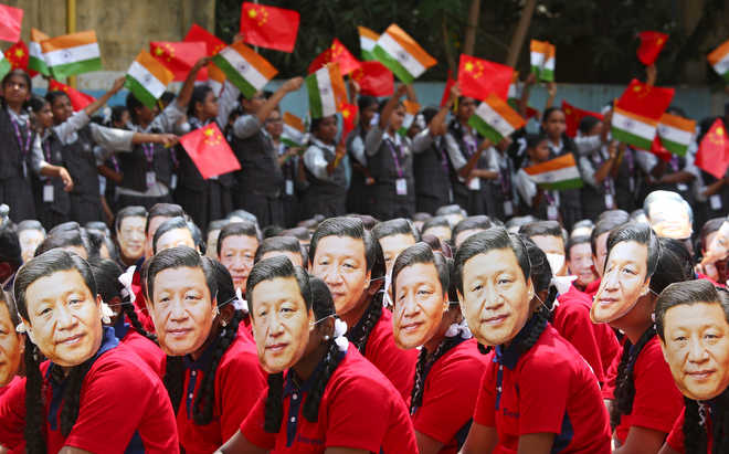 Against Kashmir backdrop, Modi-Xi talks begin today