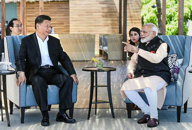 We begin a new chapter in our ties: PM Modi to Xi