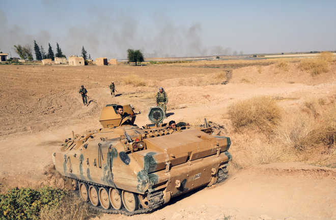 IS families escape Syria camp as Turkey battles Kurds