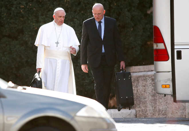 Pope’s bodyguard resigns over leak scandal