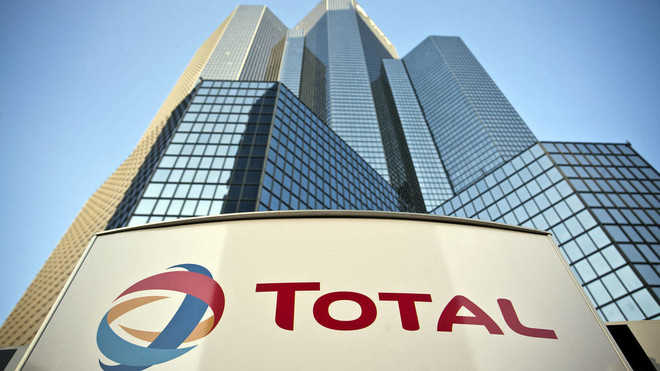 French energy giant Total to buy 37.4% stake in Adani Gas