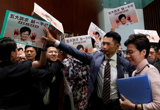 Heckled, HK leader aborts policy address