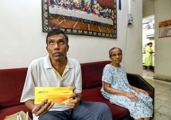 Money stuck for nearly a month, PMC Bank depositors stare at uncertain future