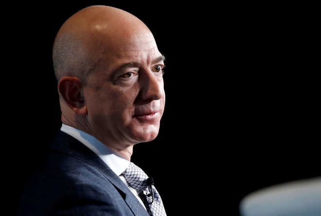 Who is Bezos, asks US student as Amazon CEO stands next to him